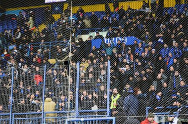 KHARKIV, UKRAINE - December 11, 2019: Atalanta Bergamasca Calcio BC fans and ultras support their team during the UEFA Champions League match, Ukraine