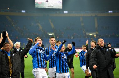 KHARKIV, UKRAINE - December 11, 2019: Atalanta player celebrate their team getting to the next round of the 1/8 finals Champions League, Ukraine