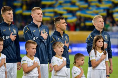 DNIPRO, UKRAINE - September 10, 2019: Ukraine national team during the anthem and friendly match between national team Ukraine against Nigeria national team, Ukraine