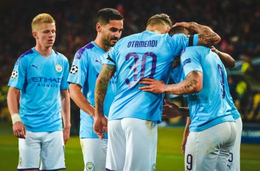 KHARKIV, UKRAINE - September 18, 2019: Nicolas Otamendi and Gabriel Jesus celebrate goal scored during the UEFA Champions League match between Shakhtar vs Manchester City (England), Ukraine