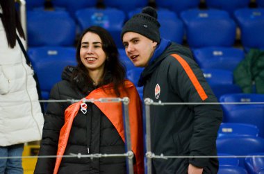 KHARKIV, UKRAINE - December 11, 2019: Football support their team  during the UEFA Champions League match between Shakhtar vs Atalanta Bergamasca Calcio BC (Italy), Ukraine