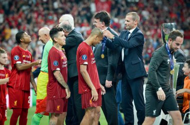 Istanbul, Turkey - August 14, 2019: Liverpool football players get gold medals during the UEFA Super Cup Finals match between Liverpool and Chelsea at Vodafone Park, Turkey