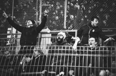 KHARKIV, UKRAINE - December 11, 2019: Atalanta Bergamasca Calcio BC fans and ultras support their team during the UEFA Champions League match, Ukraine