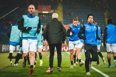 KHARKIV, UKRAINE - December 11, 2019: Andrea Masiello and Papu Gomez during the UEFA Champions League match between Shakhtar vs Atalanta BC (Italy), Ukraine