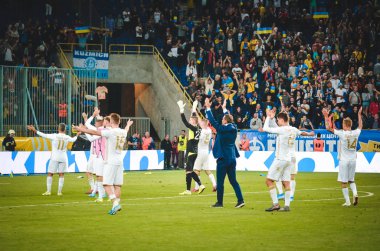 DNIPRO, UKRAINE - September 10, 2019: Ukraine national team players celebrate with fans and thank them for their support during the friendly match between Ukraine against Nigeria, Ukraine