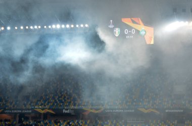 LVIV, UKRAINE - November 07, 2019: Stadium in the fog with a scoreboard during the UEFA Europa League match between Alexandria (Ukraine) vs AS Saint Etienne (France), Ukraine
