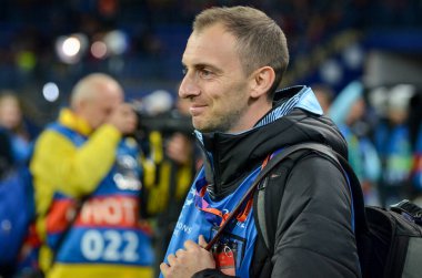 KHARKIV, UKRAINE - September 18, 2019: Journalists and photographers with a camera make report during the UEFA Champions League match, Ukraine