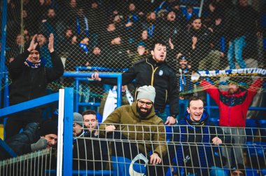 KHARKIV, UKRAINE - December 11, 2019: Atalanta Bergamasca Calcio BC fans and ultras support their team during the UEFA Champions League match, Ukraine