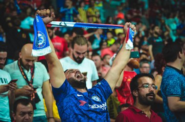 Istanbul, Turkey - August 14, 2019: Chelsea  Football fans and spectators during the UEFA Super Cup Finals match between Liverpool and Chelsea at Vodafone Park in Vodafon Arena, Turkey
