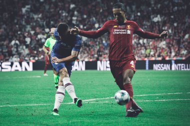 Istanbul, Turkey - August 14, 2019: Olivier Giroud and Virgil van Dijk during the UEFA Super Cup Finals match between Liverpool and Chelsea at Vodafone Park in Vodafone Arena, Turkey