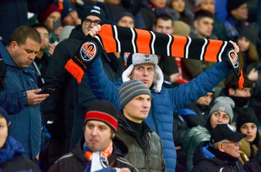 KHARKIV, UKRAINE - December 11, 2019: Football support their team  during the UEFA Champions League match between Shakhtar vs Atalanta Bergamasca Calcio BC (Italy), Ukraine