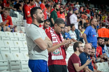 Istanbul, Turkey - August 14, 2019: Liverpool Football fans and spectators during the UEFA Super Cup Finals match between Liverpool and Chelsea at Vodafone Park in Vodafon Arena, Turkey