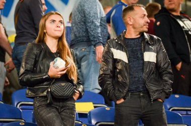 DNIPRO, UKRAINE - September 10, 2019: Football fans and spectators support the team during the friendly match between national team Ukraine against Nigeria, Ukraine