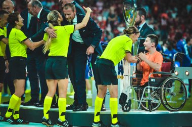Istanbul, Turkey - August 14, 2019: Alexander Cheferin and Uefa leadership present medals at the award ceremon for Women's Referees Panel led by Judge Stephanie Frappart, Turkey