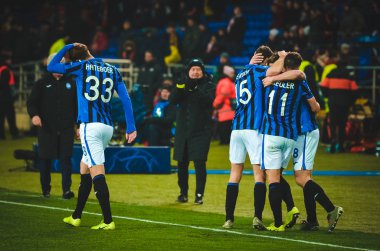 KHARKIV, UKRAINE - December 11, 2019: Atalanta player celebrate their team getting to the next round of the 1/8 finals Champions League, Ukraine