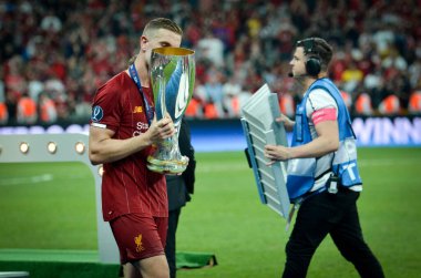 Istanbul, Turkey - August 14, 2019: Jordan Henderson with UEFA Super Cup celebrate victory at award ceremony at Vodafone Park in Vodafone Arena, Turkey