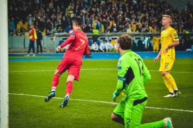 Kyiv, Ukrayna - 14 Ekim 2019: Cristiano Ronaldo, Uefa Euro 2020 ön eleme karşılaşmasında Portekiz, Ukrayna ile oynanan karşılaşmada aldığı penaltı sonrasında atılan golü kutladı