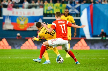 SAINT-PETERSBURG, RUSSIA - November 16, 2019: Eden Hazard and  Roman Zobnin during UEFA EURO 2020 qualifying match between Russia against Belgium national team, Russia