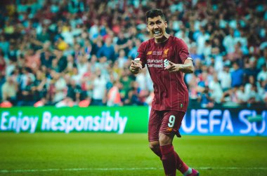 Istanbul, Turkey - August 14, 2019: Roberto Firmino celebrate penalty goal scored during the UEFA Super Cup Finals match between Liverpool and Chelsea at Vodafone Park, Turkey