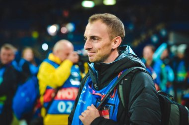 KHARKIV, UKRAINE - September 18, 2019: Journalists and photographers with a camera make report during the UEFA Champions League match, Ukraine
