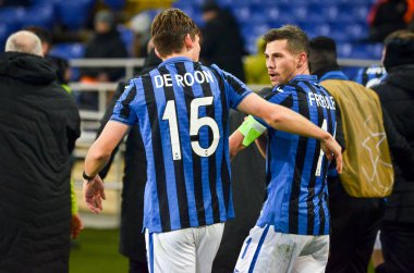 KHARKIV, UKRAINE - December 11, 2019:  Marten de Roon and Remo Freuler during the UEFA Champions League match between Shakhtar vs Atalanta Calcio BC (Italy), Ukraine
