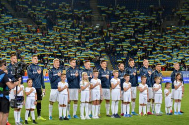 DNIPRO, UKRAINE - September 10, 2019: Ukraine national team during the anthem and friendly match between national team Ukraine against Nigeria national team, Ukraine