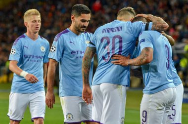 KHARKIV, UKRAINE - September 18, 2019: Nicolas Otamendi and Gabriel Jesus celebrate goal scored during the UEFA Champions League match between Shakhtar vs Manchester City (England), Ukraine