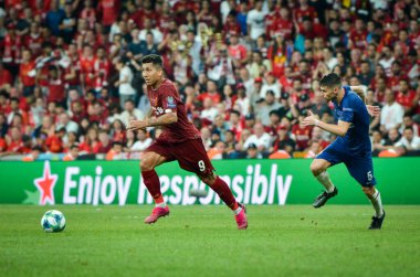 Istanbul, Turkey - August 14, 2019: Roberto Firmino and Jorginho during the UEFA Super Cup Finals match between Liverpool and Chelsea at Vodafone Park in Vodafone Arena, Turkey