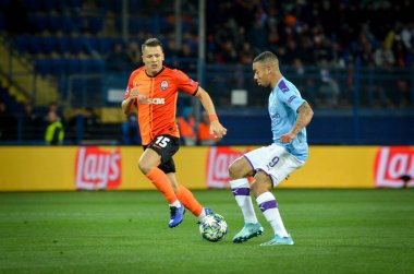 KHARKIV, UKRAINE - September 18, 2019: Gabriel Jesus and Yevgen Konoplyanka during the UEFA Champions League match between Shakhtar vs Manchester City, Ukraine
