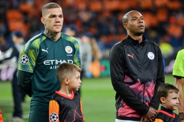 KHARKIV, UKRAINE - September 18, 2019: Fernandinho and Ederson during the UEFA Champions League match between Shakhtar Donetsk vs Manchester City (England), Ukraine