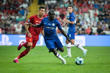 Istanbul, Turkey - August 14, 2019: N'Golo Kante and Roberto Firmino during the UEFA Super Cup Finals match between Liverpool and Chelsea at Vodafone Park in Vodafone Arena, Turkey