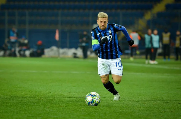 KHARKIV, UKRAINE - December 11, 2019: Papu Gomez player during the UEFA Champions League match between Shakhtar vs Atalanta Bergamasca Calcio BC (Italy), Ukraine