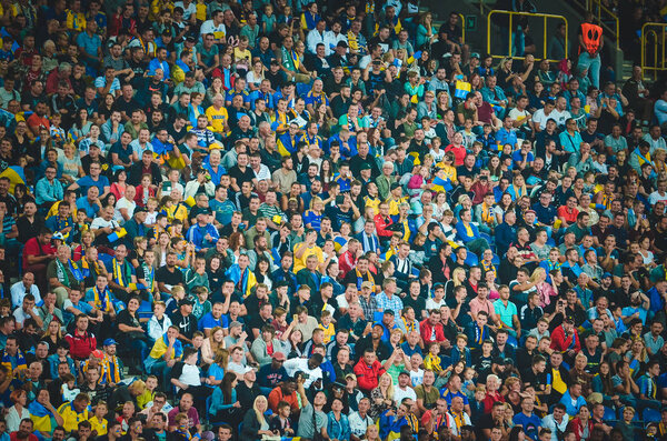 DNIPRO, UKRAINE - September 10, 2019: Football fans and spectators during the friendly match between national team Ukraine against Nigeria national team, Ukraine