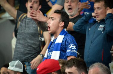 Istanbul, Turkey - August 14, 2019: Chelsea  Football fans and spectators during the UEFA Super Cup Finals match between Liverpool and Chelsea at Vodafone Park in Vodafon Arena, Turkey