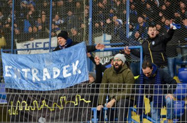 KHARKIV, UKRAINE - December 11, 2019: Atalanta Bergamasca Calcio BC fans and ultras support their team during the UEFA Champions League match, Ukraine