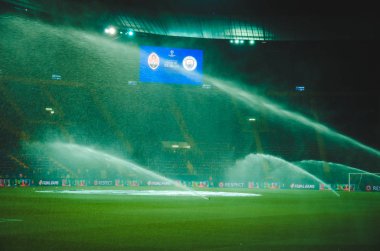 KHARKIV, UKRAINE - September 18, 2019: General view of the stadium close up and watering the lawn during the UEFA Champions League match, Ukraine