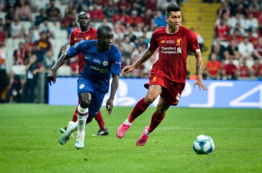 Istanbul, Turkey - August 14, 2019: N'Golo Kante and Roberto Firmino during the UEFA Super Cup Finals match between Liverpool and Chelsea at Vodafone Park in Vodafone Arena, Turkey