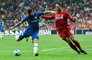 Istanbul, Turkey - August 14, 2019: Olivier Giroud and Virgil van Dijk during the UEFA Super Cup Finals match between Liverpool and Chelsea at Vodafone Park in Vodafone Arena, Turkey