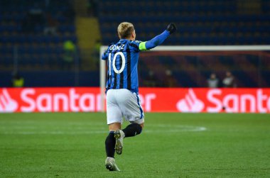 KHARKIV, UKRAINE - December 11, 2019: Papu Gomez celebrate goal scored during the UEFA Champions League match between Shakhtar vs Atalanta Calcio BC (Italy), Ukraine