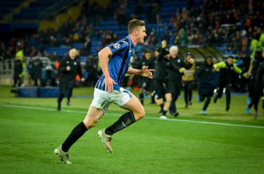 KHARKIV, UKRAINE - December 11, 2019: Robin Gosens celebrate goal scored during the UEFA Champions League match between Shakhtar vs Atalanta Bergamasca Calcio BC (Italy), Ukraine