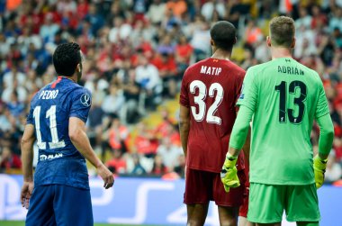 Istanbul, Turkey - August 14, 2019: Pedro and Joel Matip during the UEFA Super Cup Finals match between Liverpool and Chelsea at Vodafone Park in Vodafone Arena, Turkey
