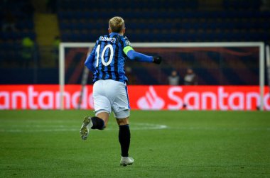 KHARKIV, UKRAINE - December 11, 2019: Papu Gomez celebrate goal scored during the UEFA Champions League match between Shakhtar vs Atalanta Calcio BC (Italy), Ukraine