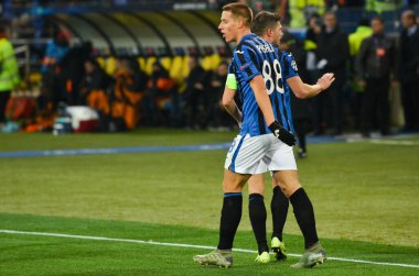 KHARKIV, UKRAINE - December 11, 2019: Atalanta player celebrate their team getting to the next round of the 1/8 finals Champions League, Ukraine
