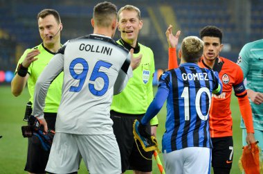 KHARKIV, UKRAINE - December 11, 2019: Pierluigi Gollini and Papu Gomez during the UEFA Champions League match between Shakhtar vs Atalanta Calcio BC (Italy), Ukraine