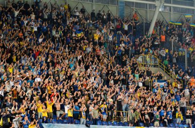 DNIPRO, UKRAINE - September 10, 2019: Football fans and spectators support the team during the friendly match between national team Ukraine against Nigeria, Ukraine