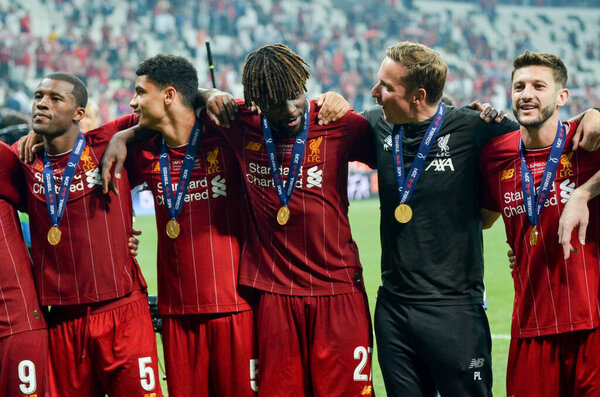 Istanbul, Turkey - August 14, 2019: Mohamed Salah celebrate victory with Liverpool  team and holdind trophy the UEFA Super Cup in Vodafone Arena, Turkey