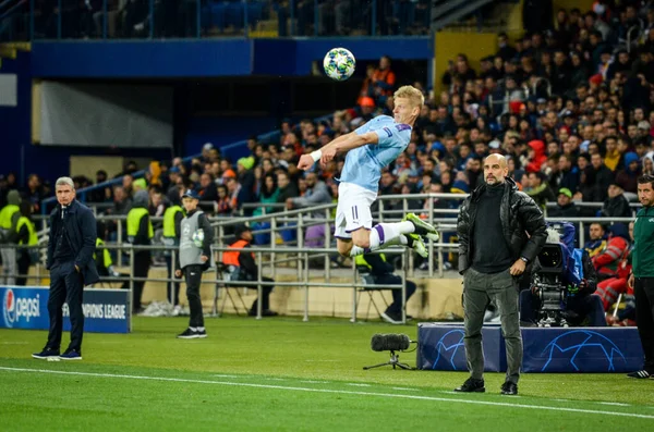 KHARKIV, UKRAINE - September 18, 2019: Oleksandr Zinchenko and Pep Guardiola during the UEFA Champions League match between Shakhtar vs Manchester City, Ukraine