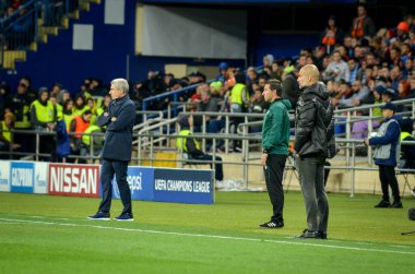 KHARKIV, UKRAINE - September 18, 2019: Pep Guardiola and Luis Castro during the UEFA Champions League match between Shakhtar Donetsk vs Manchester City (England), Ukraine