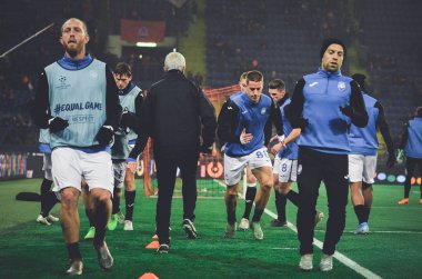 KHARKIV, UKRAINE - December 11, 2019: Andrea Masiello and Papu Gomez during the UEFA Champions League match between Shakhtar vs Atalanta BC (Italy), Ukraine