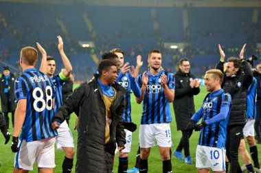 KHARKIV, UKRAINE - December 11, 2019: Atalanta player celebrate their team getting to the next round of the 1/8 finals Champions League, Ukraine